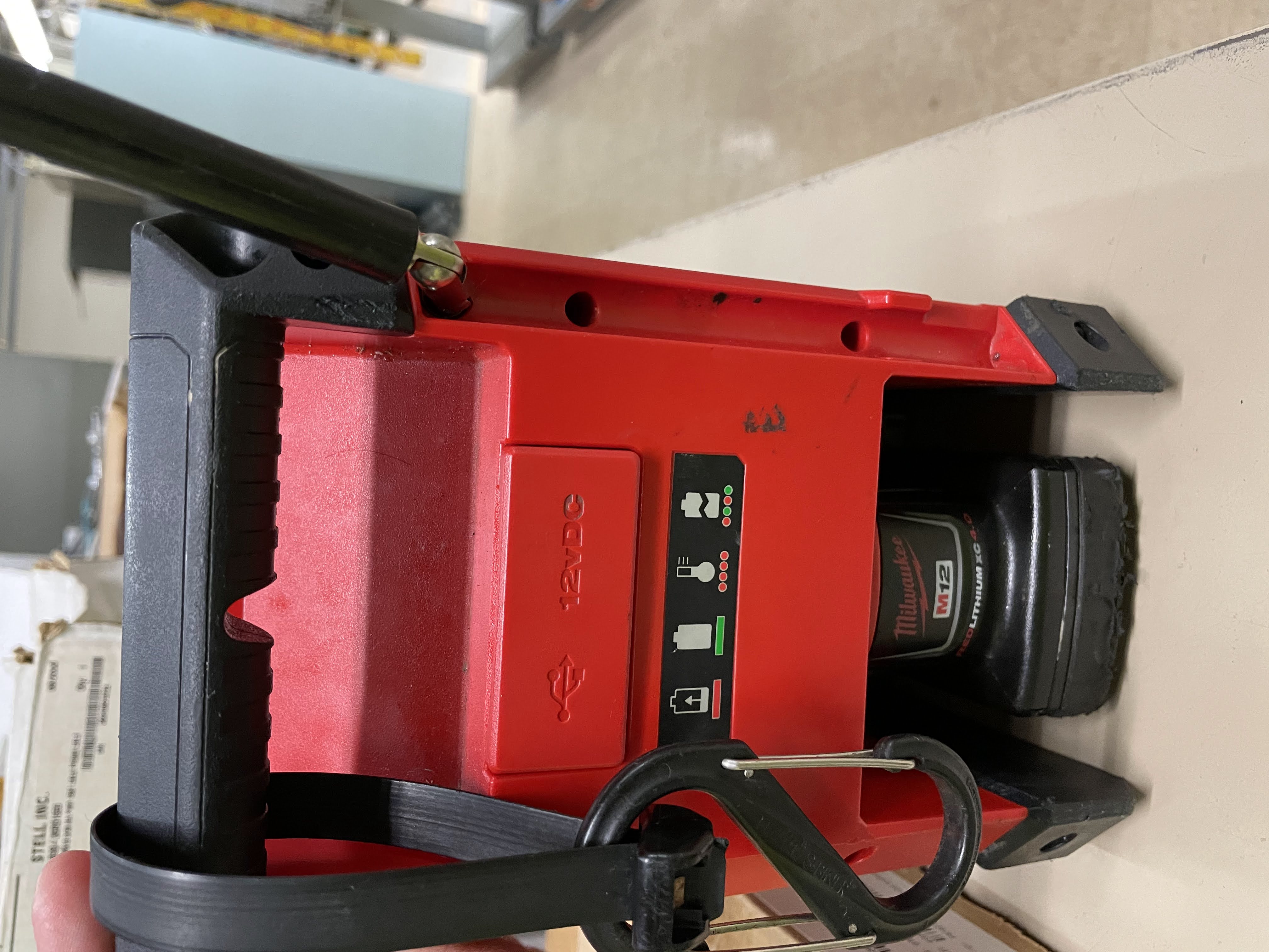 Milwaukee Radio + Charger detail view